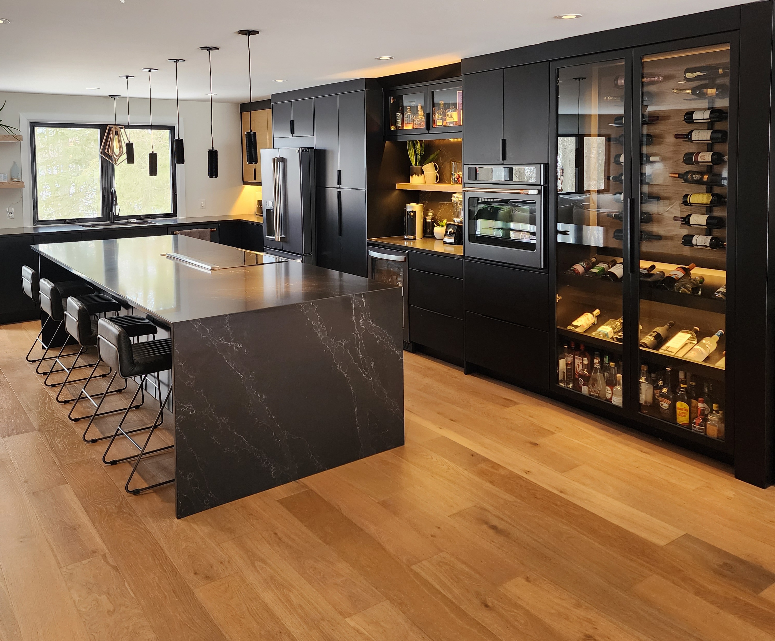 Modern black kitchen with soap stone counters